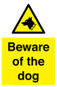 beware-of-the-dog-with-dog-warning-symbol~